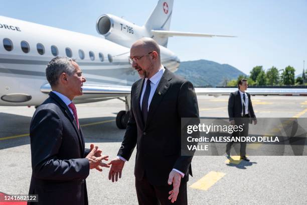 President of the Swiss Confederation Ignazio Cassis welcomes Prime Minister of Ukraine Denys Shmyhal, on July 3, 2022 in Lugano. - Cassis and Shmyhal...