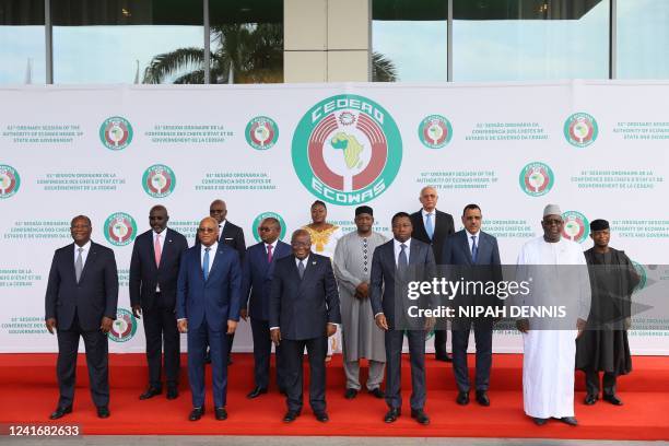 Economic Community of West African States heads of state and government pose for a group photo at the ECOWAS 61st Ordinary Session in Accra, Ghana,...