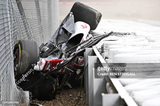 Alfa Romeo Chinese driver Zhou Guanyu is seen in the crash barriers during an incident at the star during the Formula One British Grand Prix at the...