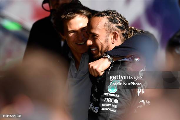 Lewis Hamilton of Great Britain and Mercedes AMG Petronas F1 Team with the actor Tom Cruise during the race of the F1 Grand Prix of Great Britain at...