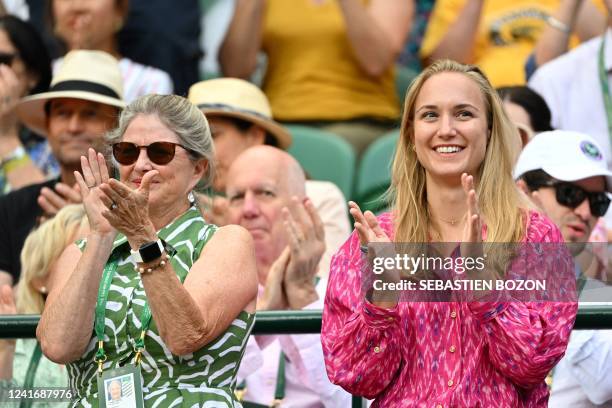 Girlfriend of Britain's Cameron Norrie, Louise Jacobi , applauds him after winning his round of 16 men's singles tennis match against US player Tommy...