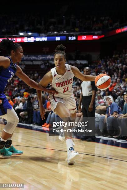 Tianna Hawkins of the Washington Mystics dribbles the ball during the game against the Connecticut Sun on July 3, 2022 at Mohegan Sun Arena in...