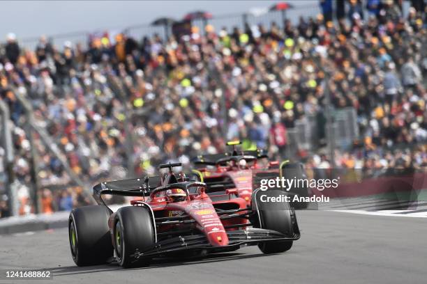 Charles Leclerc of Monaco driving the Ferrari F1-75 and Carlos Sainz of Spain driving the Scuderia Ferrari F1-75 during the British Grand Prix 2022...