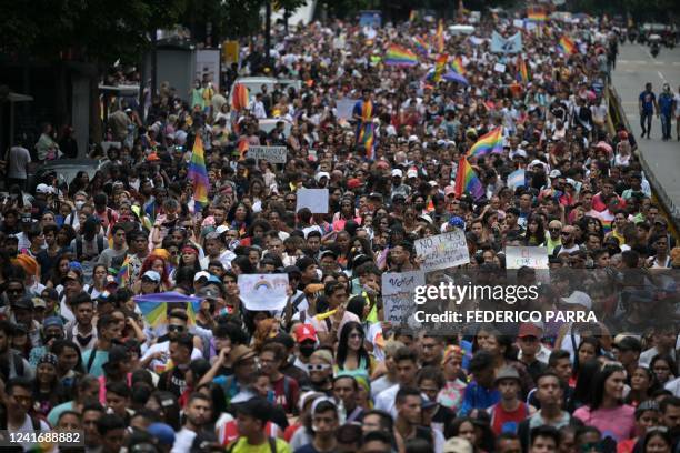 Members of the Lesbian, Gay, Bisexual and Transgender community take part the annual Pride Parade in Caracas on July 3, 2022.