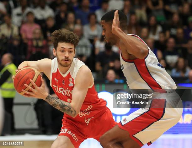 July 03: Turkiyeâs Sehmus Hazer defends during the FIBA Basketball World Cup 2023 qualifiers England v. Turkiye at the Vertu Motors Arena in...