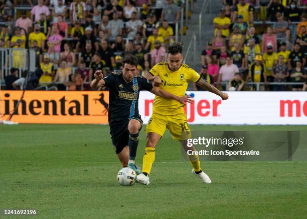 Columbus Crew midfielder Lucas Zelarayan and Philadelphia Union defender Jack Elliott battle for the ball during the game between the Columbus Crew...