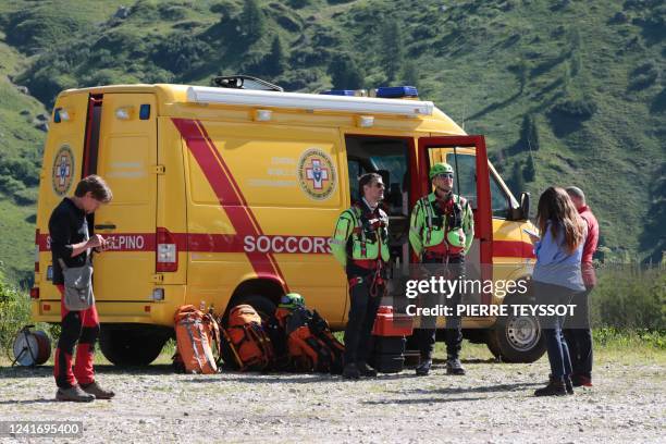 Rescuers get ready for search operations on July 4, 2022 after the glacier on the mountain of Marmolada, the highest in the Dolomites, collapsed the...