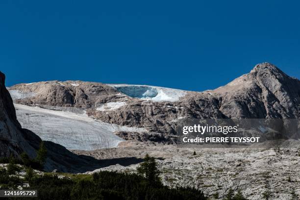 This view taken on July 4, 2022 shows the glacier that collapsed the day before on the mountain of Marmolada, the highest in the Dolomites, one day...