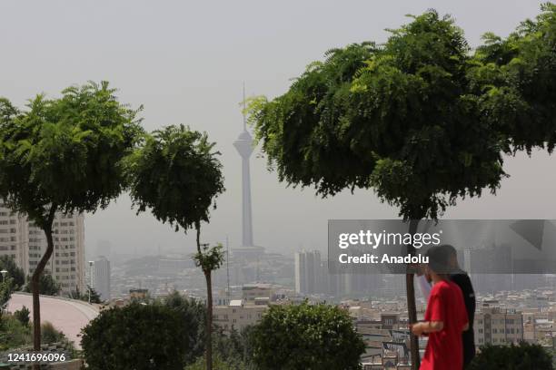 General view of the city turning gray due to the high levels of air pollution in Tehran, Iran on July 04, 2022. All educational and governmental...