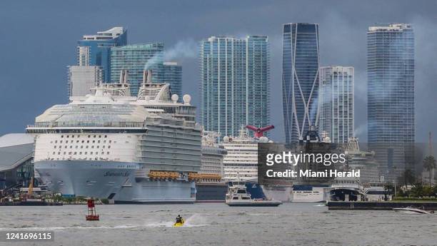 Cruise ships lineup before departure along the Port of Miami on Saturday, June 25, 2022.