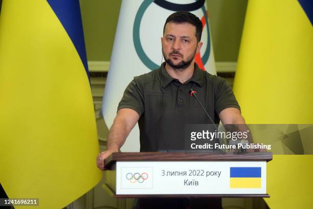 President of Ukraine Volodymyr Zelenskyy is pictured during a joint briefing with President of the International Olympic Committee Thomas Bach, Kyiv,...