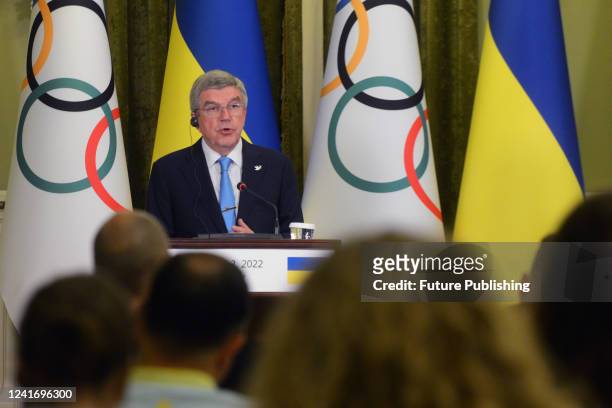 President of the International Olympic Committee Thomas Bach speaks during a joint briefing with President of Ukraine Volodymyr Zelenskyy, Kyiv,...