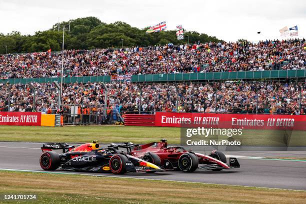 Sergio Perez, Oracle Red Bull Racing, RB18, action overtaking 16 Charles Leclerc, Scuderia Ferrari, F1-75, action during the Formula 1 Grand Prix of...