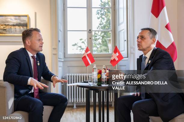 President of the Swiss Confederation Ignazio Cassis chats with Denmark's Minister of Foreign Affairs Jeppe Kofod as they meet for a bilateral meeting...