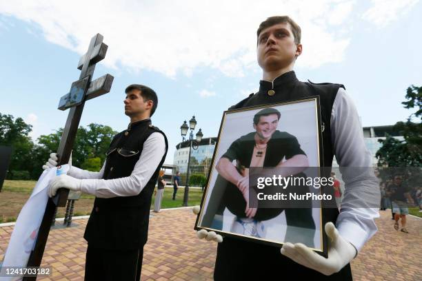 Relatives and friends attend a farewell ceremony for the late Ukrainian soccer coach Oleksandr Shyshkov who died during a rocket attack in Odesa...
