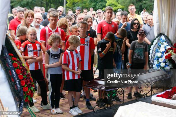 Children of the soccer club ''Athletic&quot; attend a farewell ceremony for the late Ukrainian soccer coach Oleksandr Shyshkov who died during a...