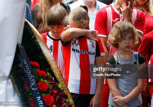 Children of soccer club ''Athletic&quot; attend a farewell ceremony for the late Ukrainian soccer coach Oleksandr Shyshkov who died during a rocket...