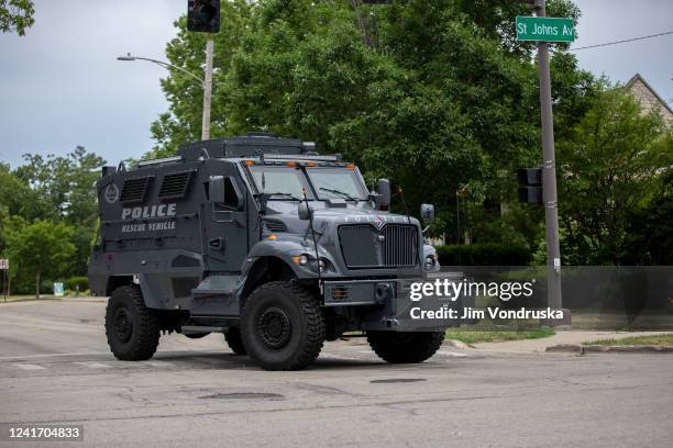 Law enforcement works the scene after a mass shooting at a Fourth of July parade on July 4, 2022 in Highland Park, Illinois. Reports indicate at...