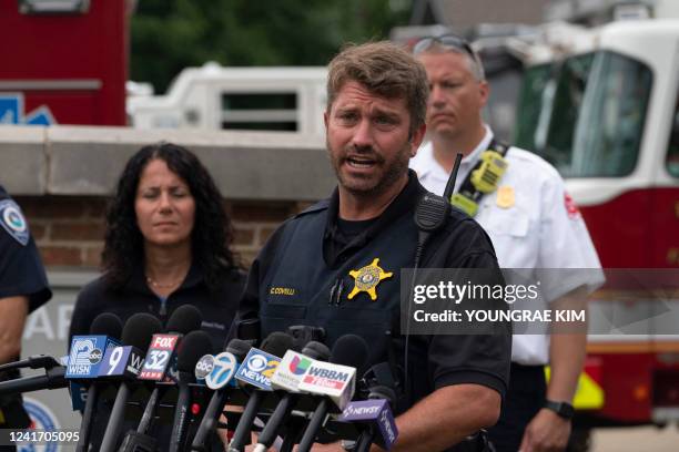 Lake County sergeant Christopher Covelli speaks at the scene of the Fourth of July parade shooting in Highland Park, Illinois on July 4, 2022. - A...