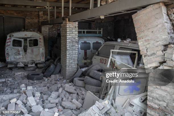 Ambulances are seen partially destroyed in a parking lot targeted by shelling in Bakhmut, Ukraine, July 04th, 2022.