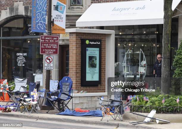 Peopleâs belongings sit along the Fourth of July parade route after people fled the scene on Monday, July 4 in Highland Park, Illinois, after a...