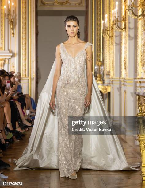 Model walks the runway during the Tony Ward Haute Couture Fall Winter 2022 2023 show as part of Paris Fashion Week At Shangri La on July 4, 2022 in...