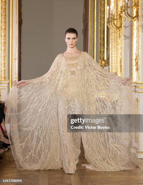 Model walks the runway during the Tony Ward Haute Couture Fall Winter 2022 2023 show as part of Paris Fashion Week At Shangri La on July 4, 2022 in...