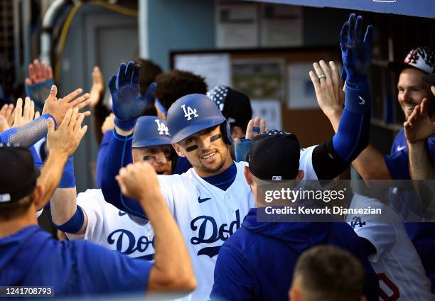 Trayce Thompson of the Los Angeles Dodgers celebrates his three-run home run against starting pitcher Kyle Freeland of the Colorado Rockies in the...