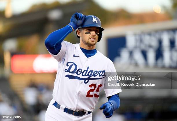 Trayce Thompson of the Los Angeles Dodgers celebrates his three-run home run against starting pitcher Kyle Freeland of the Colorado Rockies in the...