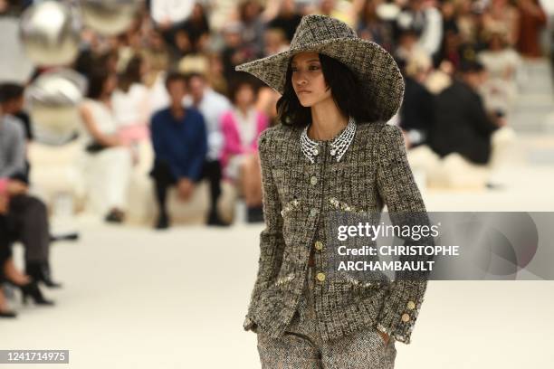 Model presents a creation for Chanel during the Women's Haute-Couture Fall - Winter 2023 Fashion Week in Paris on July 5, 2022.