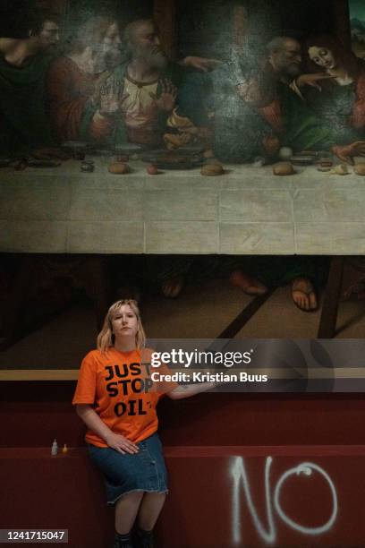 Five Just Stop Oil activists spray paint the wall and glue themselves to the frame of the painting the Last Supper on the 5th of July 2022, Royal...