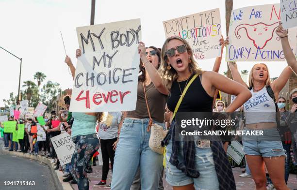 Abortion rights protesters chant during a Pro Choice rally at the Tucson Federal Courthouse in Tucson, Arizona on Monday, July 4, 2022.