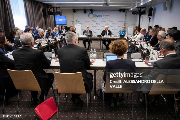 President of the Swiss Confederation Ignazio Cassis and Ukrainian Prime Minister Denys Shmyhal attend the Post-Lugano-Coordination Meeting to discuss...