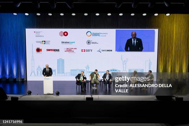 Ukrainian Prime Minister Denys Shmyhal delivers a speech next to Chair of the Board, Swiss Investment Fund Joerg Frieden , Ukraine's MP Davyd...