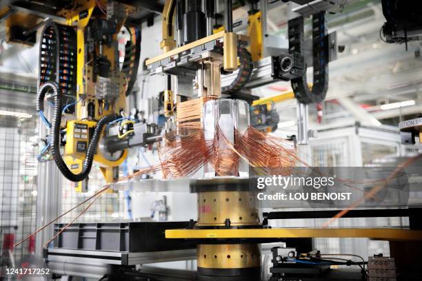 This photograph on July 5 shows an equipment of an electric car, at the cars's Renault factory, in Cleon, northwestern France.