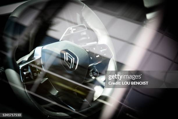 This photograph taken on July 5 shows a steering wheel with a Renault logo, at the Renault factory in Cleon, northwestern France.