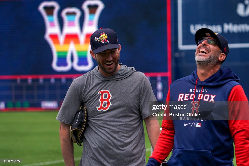 Worcester Red Sox manager Chad Tracy and Worcester Red Sox bench