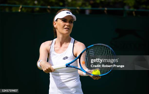 Agnieszka Radwanska of Poland playing with partner Jelena Jankovic of Serbia against Francesca Schiavone of Italy and Flavia Pennetta of Italy in...