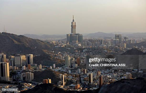 The Abraj Al-Bait Towers also known as the Mecca Royal Hotel Clock Tower, is seen from Jabal al-Noor or 'Mountain of Light' overlooking the holy city...