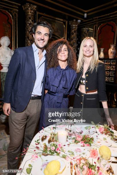 Alexandre Boutry, Kenza Echouafni and Lauren Santo Domingo at Galerie Gismondi on July 5, 2022 in Paris, France.