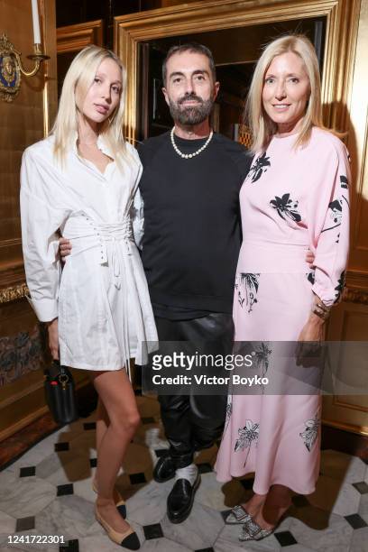 Maria Olympia of Greece and Denmark, Giambattista Valli and Marie-Chantal, Crown Princess of Greece at Galerie Gismondi on July 5, 2022 in Paris,...