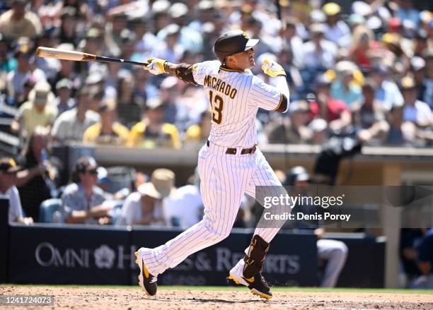 Manny Machado of the San Diego Padres hits a double during the fifth inning of a baseball game against the Seattle Mariners on July 5, 2022 at Petco...