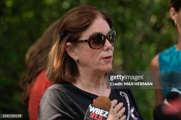 Charlotte Bank, who knew the mass shooting suspect, Robert Crimo III through church, speaks to the media ahead of a vigil for the victims of the 4th...