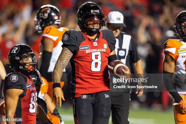 Ottawa Redblacks quarterback Jeremiah Masoli with the ball after a touchdown during Canadian Football League action between the BC Lions and Ottawa...