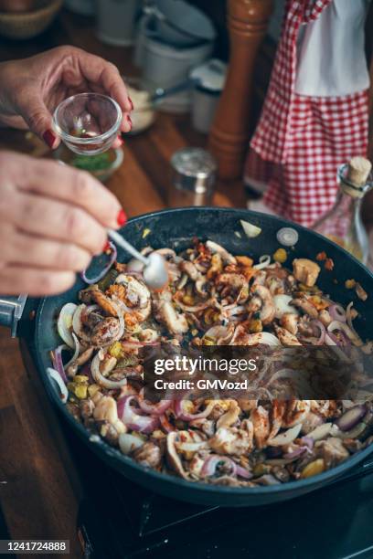 preparing vegan mushroom stroganoff - beef stroganoff stock pictures, royalty-free photos & images