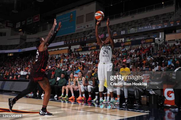 Jewell Loyd of the Seattle Storm shoots a three point basket during the game against the Indiana Fever on July 5, 2022 at Gainbridge Fieldhouse in...