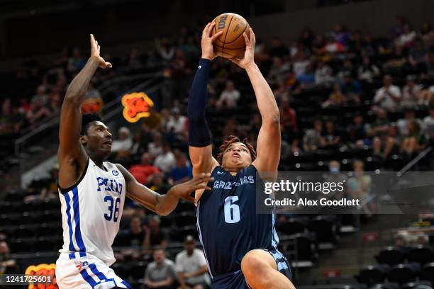 Kenneth Lofton Jr. #6 of the Memphis Grizzlies goes up for a shot against Aminu Mohammed of the Philedelphia 76ers #during a NBA Summer League game...