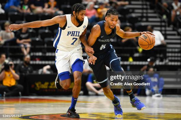 Ziaire Williams of the Memphis Grizzlies drives against Isaiah Joe of the Philadelphia 76ers during a NBA Summer League game at Vivint Arena on July...