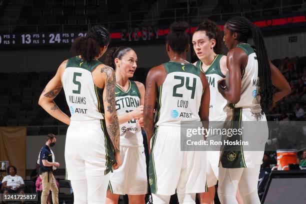 Sue Bird talks to Gabby Williams, Jewell Loyd, Breanna Stewart and Ezi Magbegor of the Seattle Storm during the game against the Indiana Fever on...