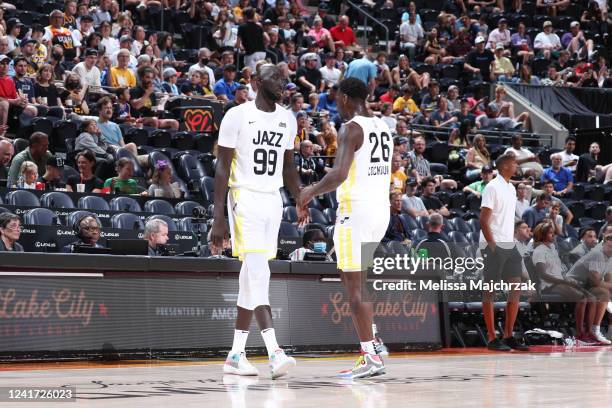 Tacko Fall and Kofi Cockburn of the Utah Jazz high five during the game against the Oklahoma City Thunder during the 2022 NBA Salt Lake City Summer...